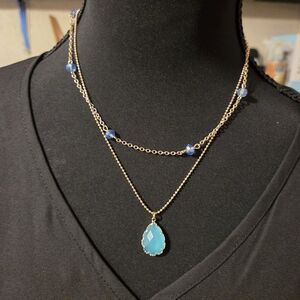 Charming Charlie Gold Necklace with Blue Accents